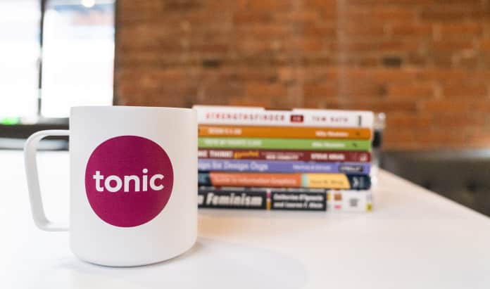 Table with books and coffee mug