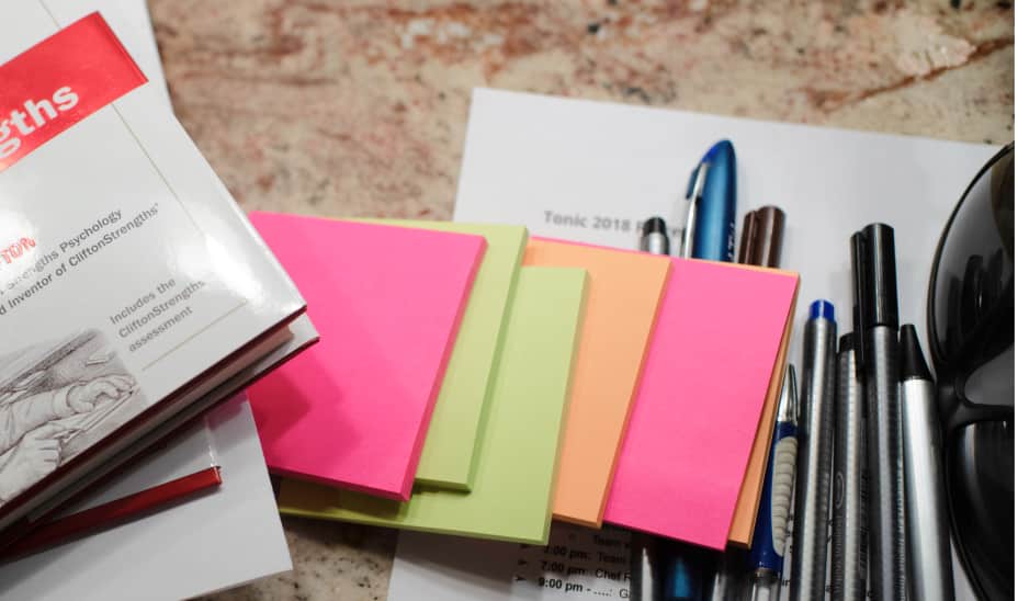 Table with stickies and pens.